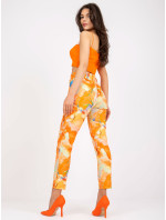 Oranžové dámske nohavice so vzormi