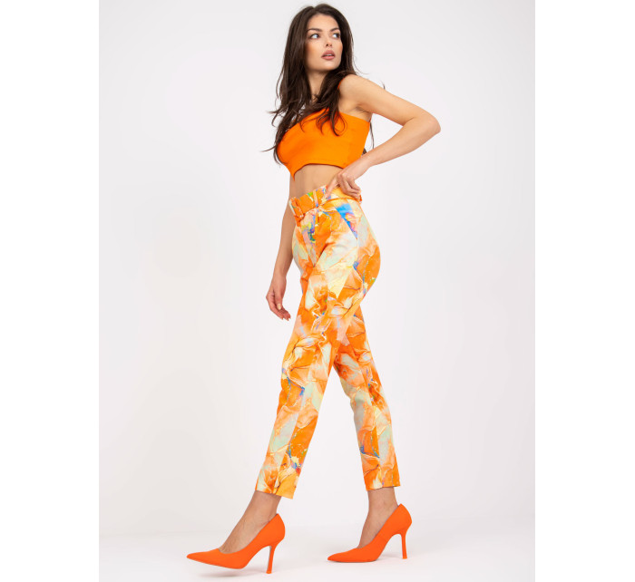 Oranžové dámske nohavice so vzormi